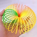 Rainbow Slinky Spring Toy – Compact, Portable Fun Toy for Kids & Adults, Great for Birthdays (1 Pc) - Image 5