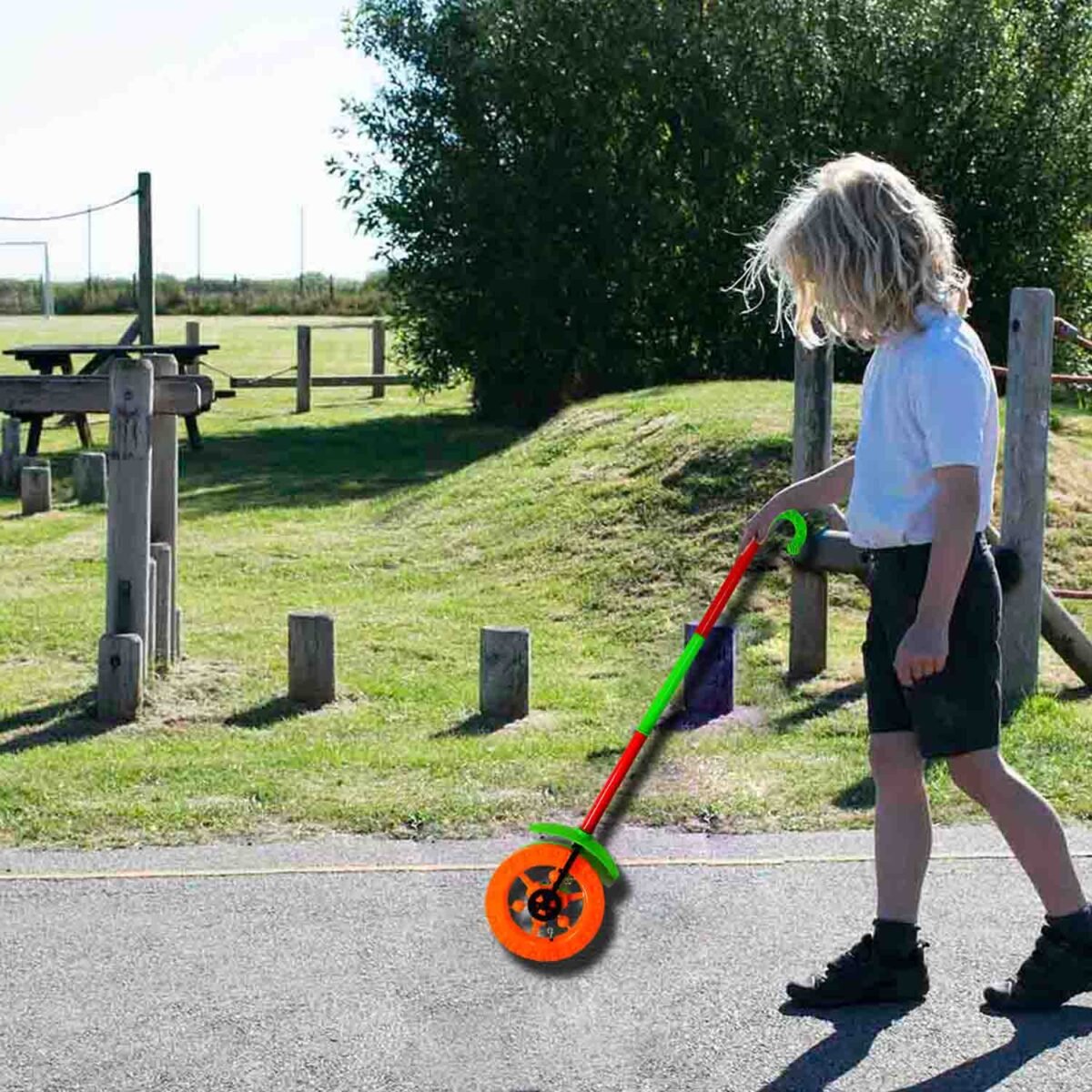 Plastic Single Wheel Push Run toy with handle and two lights on wheel. push toy for Kids. - Image 1
